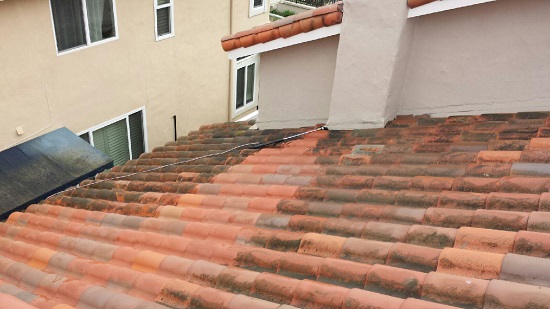 See the difference on this roof after just one blast of our pressure washer