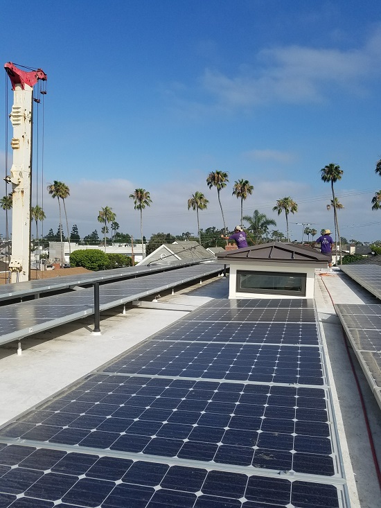Before and after photos of solar panel cleaning