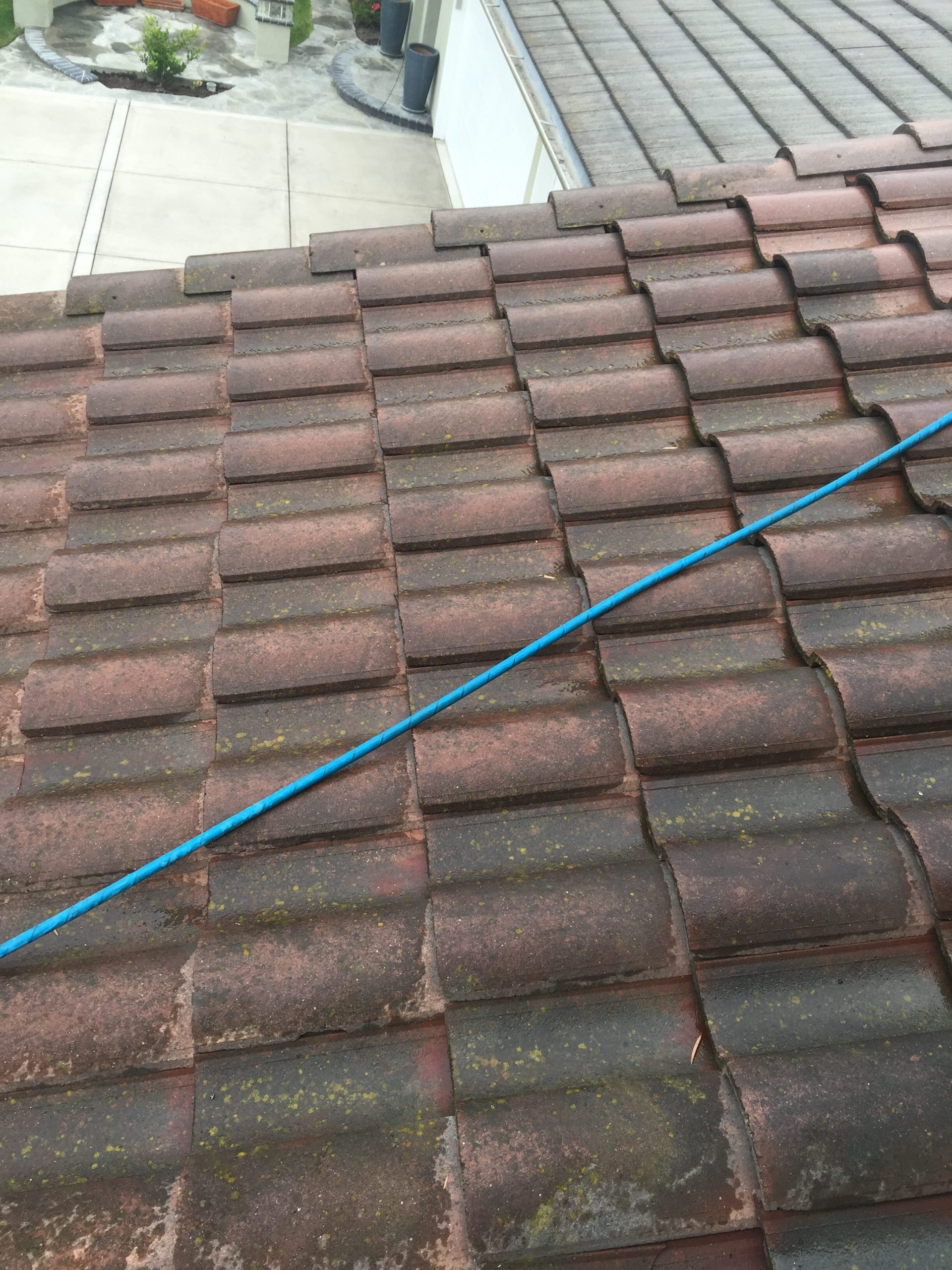 Before roof cleaning began, a lot of dirt from years of build up